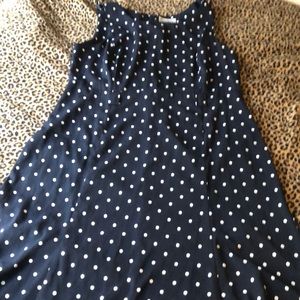 Polka dot navy and white dress missing belt.